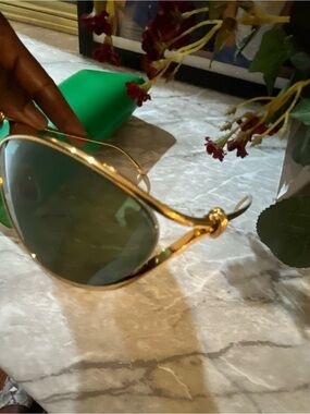 Bottega Veneta Gold Frame Sunglasses with Green Lenses